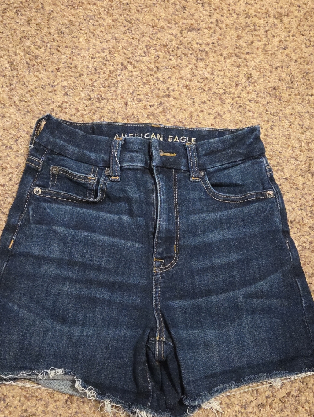 American Eagle dark blue denim jeans with contrast stitching